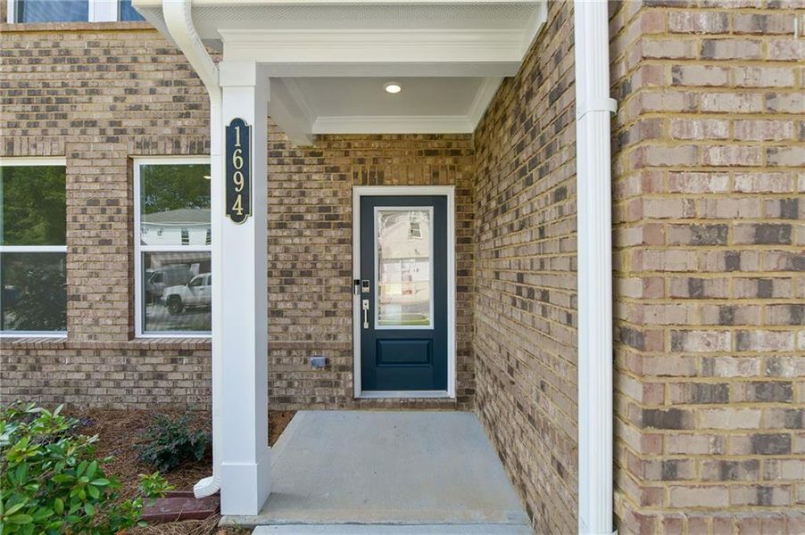 Exterior details and patio area of a home in Windance Lake, Loganville (Image 23).