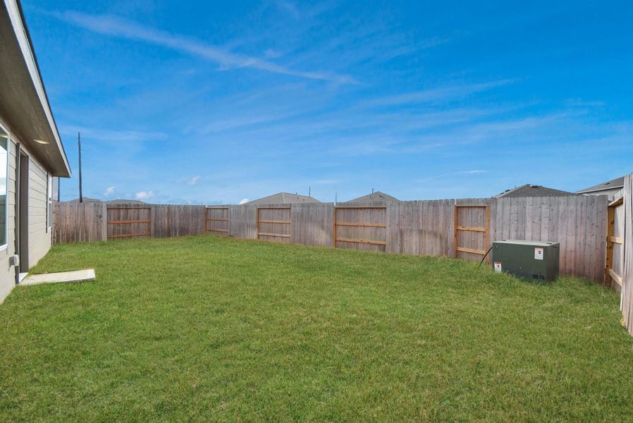Exterior details and patio area of a home in , Katy (Image 25). Exterior details and patio area of a home in , Katy (Image 25).