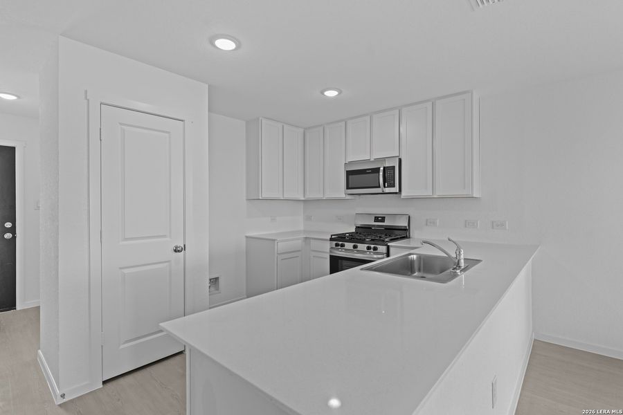 Furnished interior view inside a new home in Hightop Ridge, Converse (Image 11).