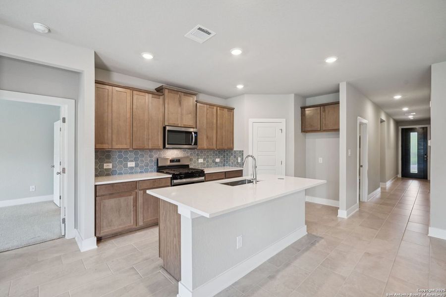 Furnished interior view inside a new home in Comanche Ridge, San Antonio (Image 10).