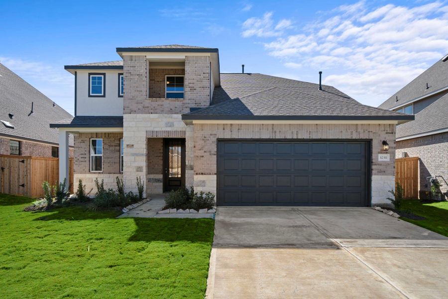 Welcome home to 32311 Cedar Elm Drive located in the Oakwood Estates community zoned to Waller ISD.