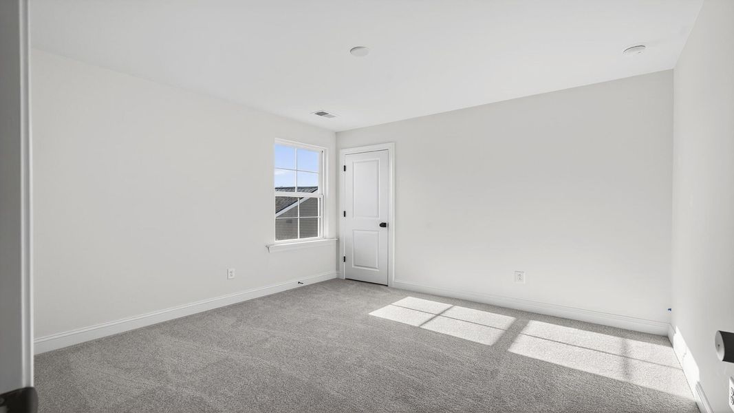 Spacious, unfurnished interior of a new home in Creekside at Andrews, Summerville (Image 24).