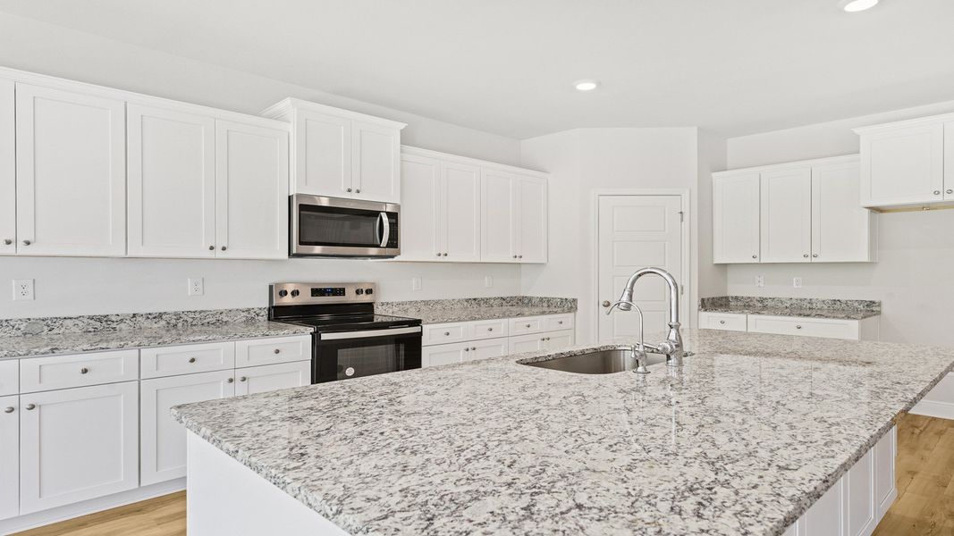 Representative furnished interior of a home built from the The Hawthorne by D.R. Horton in Meadows at Rehwinkel, Crawfordville (Image 37).