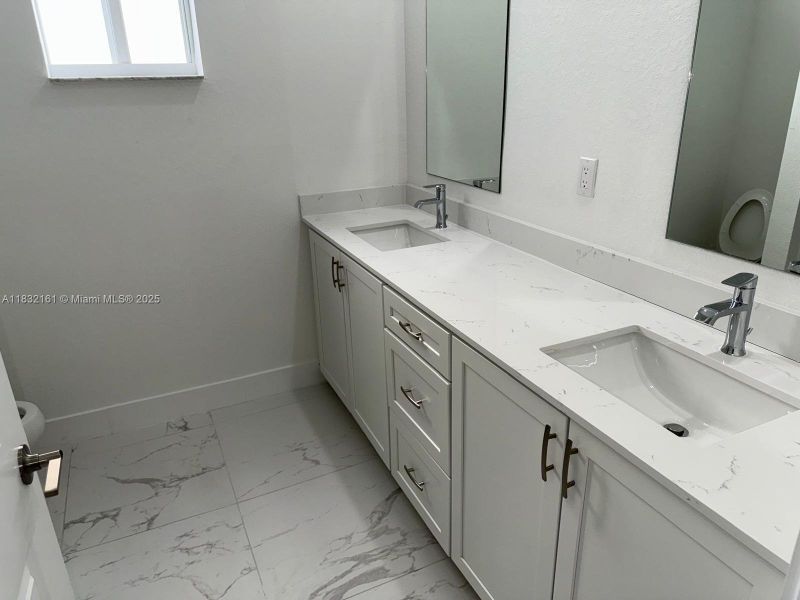 Furnished interior view inside a new home in , Homestead (Image 7). Furnished interior view inside a new home in , Homestead (Image 7).