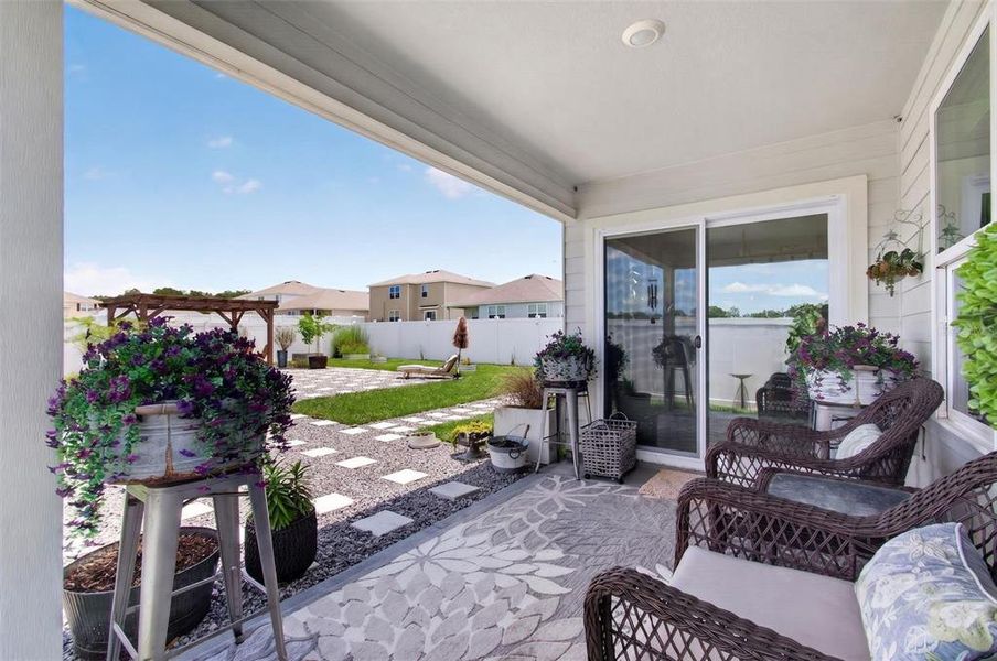 Exterior details and patio area of a home in Briarwood, Alachua (Image 21).