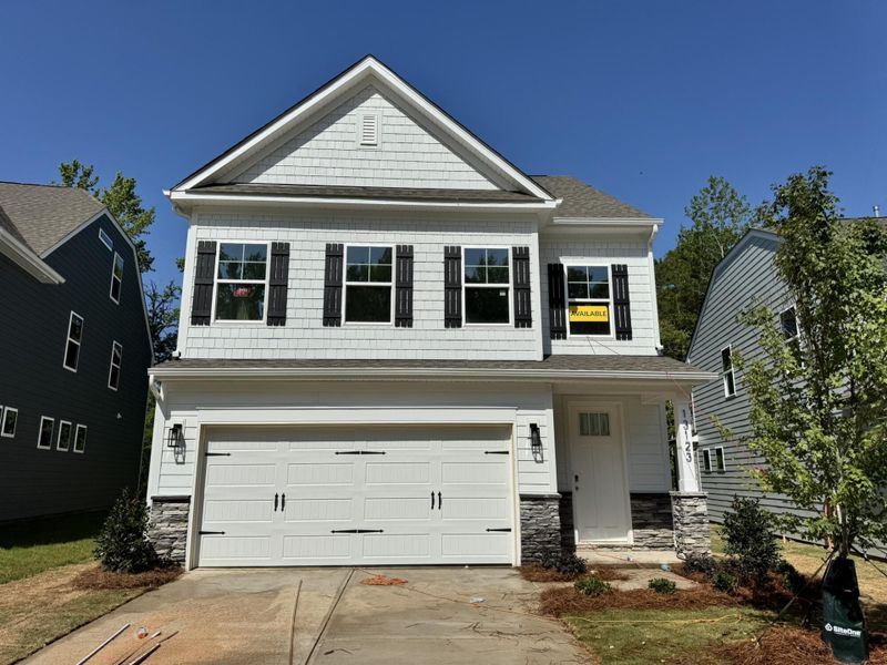 Front exterior of a new home in Caldwell Forest, Charlotte, NC, highlighting curb appeal (Image 1). Front exterior of a new home in Caldwell Forest, Charlotte, NC, highlighting curb appeal (Image 1).