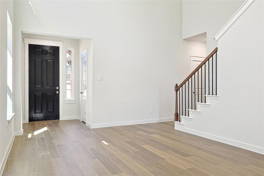 Entryway featuring hardwood / wood-style flooring