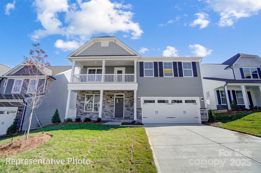 Front exterior of a new home in Ashton Park, Monroe, NC, highlighting curb appeal (Image 2).