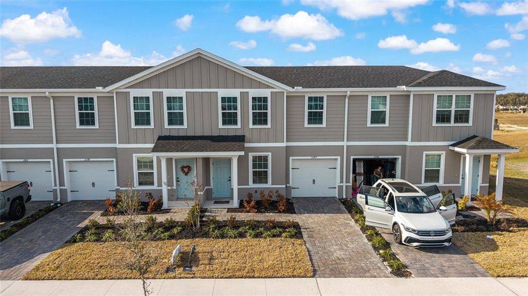 Front exterior of a new home in , Lady Lake, FL, highlighting curb appeal (Image 25). Front exterior of a new home in , Lady Lake, FL, highlighting curb appeal (Image 25).