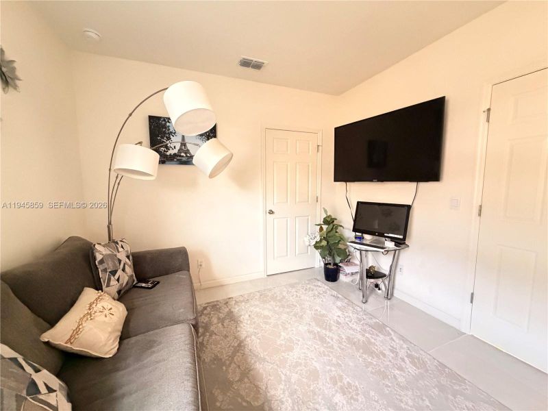 Furnished interior view inside a new home in , Port St. Lucie (Image 36).