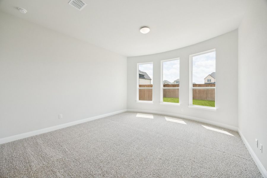 Representative unfurnished interior of a home built from the Regency II by Megatel Homes in Bellagio, Forney (Image 9).