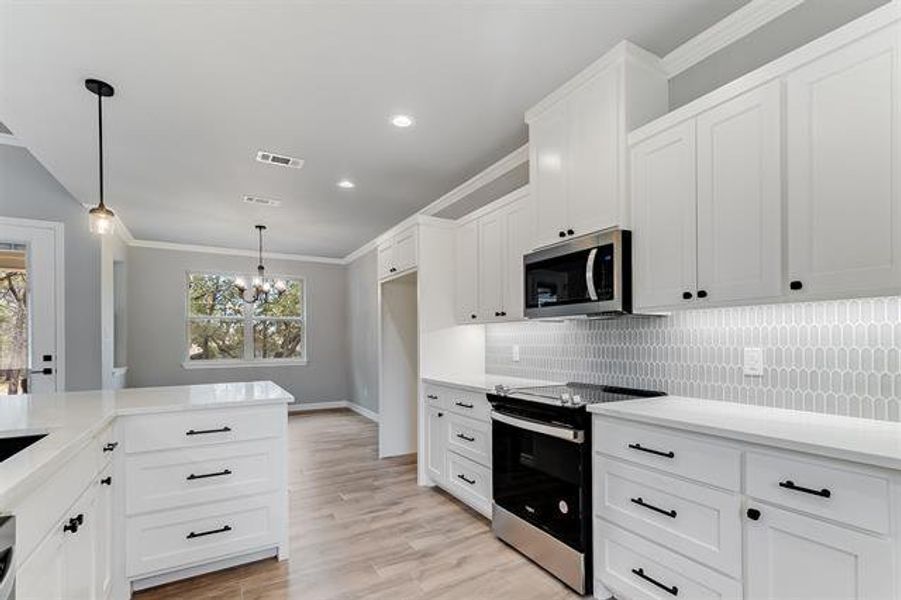 Furnished interior view inside a new home in , Marble Falls (Image 10). Furnished interior view inside a new home in , Marble Falls (Image 10).