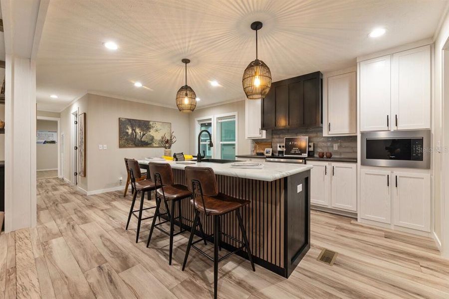 Furnished interior view inside a new home in , Okeechobee (Image 6).