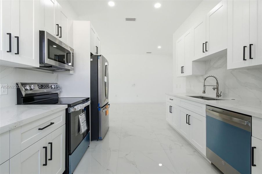 Furnished interior view inside a new home in , Lehigh Acres (Image 9).