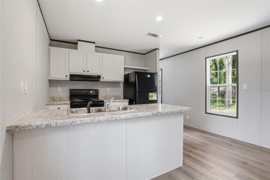 Furnished interior view inside a new home in , Ocala (Image 5).
