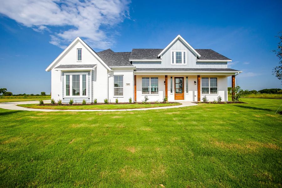 Representative exterior photo of a completed home built from the The Paxton by Elmwood Custom Homes in Matthews Farm, Venus, TX (Image 5). Representative exterior photo of a completed home built from the The Paxton by Elmwood Custom Homes in Matthews Farm, Venus, TX (Image 5).