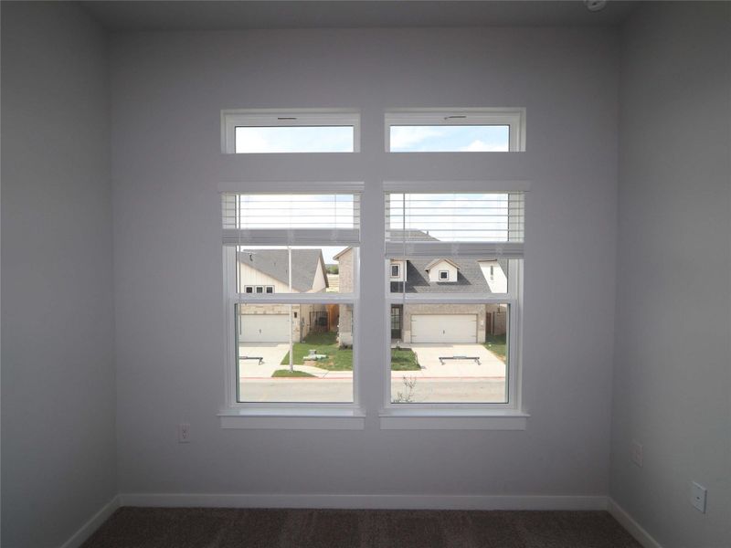 Spacious, unfurnished interior of a new home in Estancia West, Manchaca (Image 13).