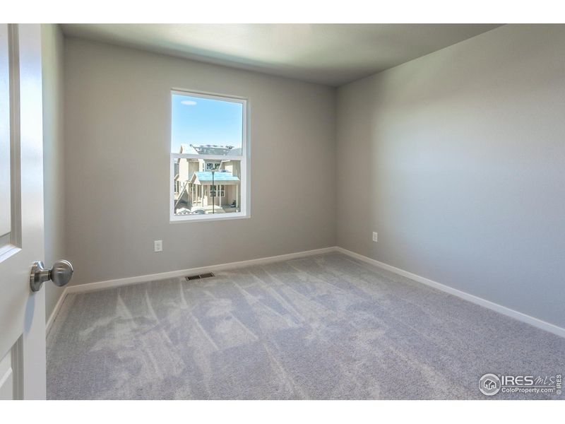 Spacious, unfurnished interior of a new home in Prairie Song, Windsor (Image 17).