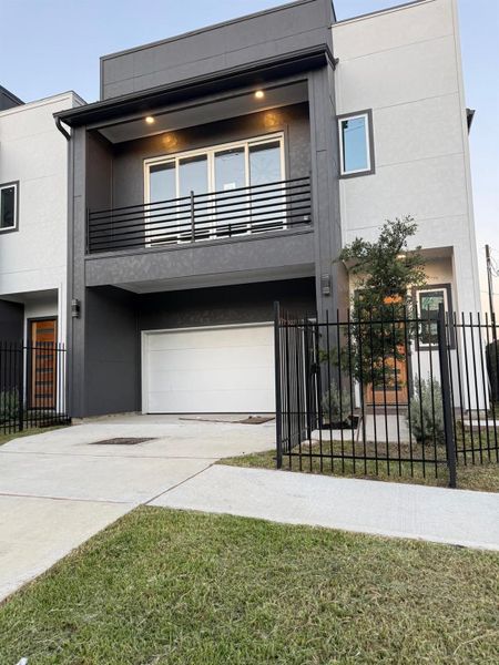 Front exterior of a new home in , Houston, TX, highlighting curb appeal (Image 12).