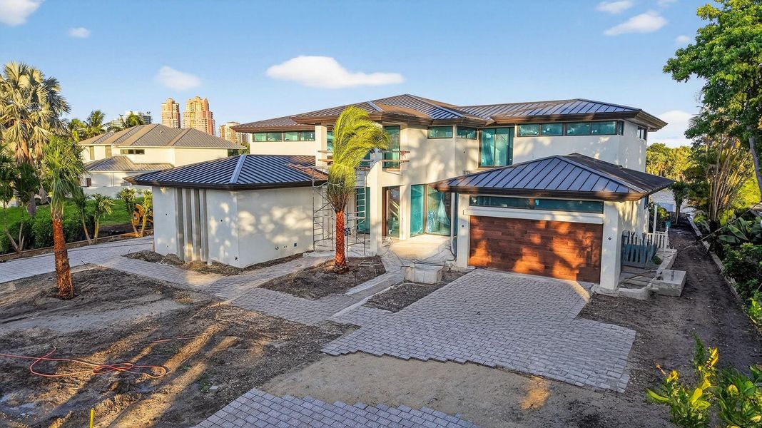 Front exterior of a new home in , Fort Lauderdale, FL, highlighting curb appeal (Image 11).