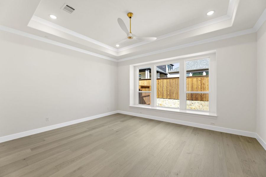 Representative unfurnished interior of a home built from the 5551 by Tradition Homes in Windsong Ranch, Prosper (Image 26).