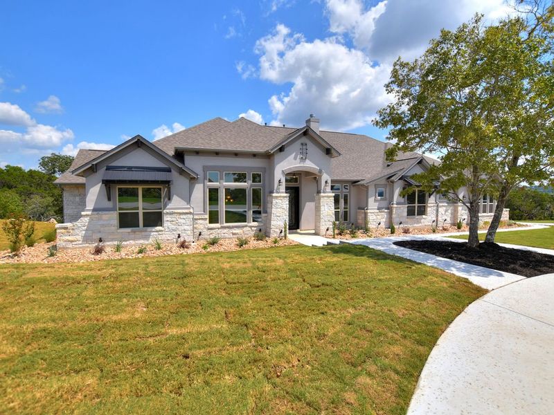 Representative exterior photo of a completed home built from the Coronado I by Giddens Homes in Clearwater Ranch, Liberty Hill, TX (Image 30).