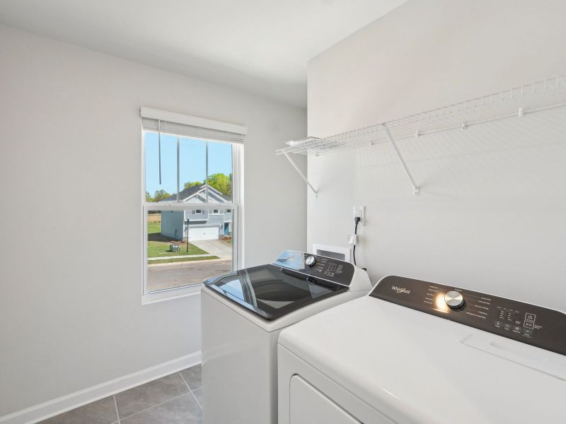 Laundry day just got easier with ample room to sort and organize your clothes.