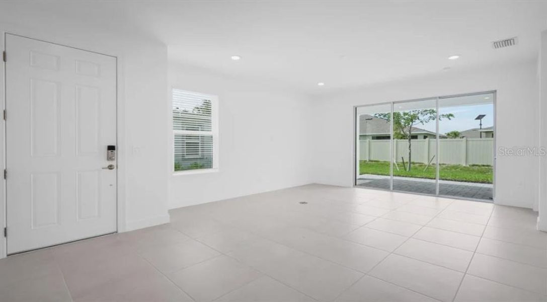 Spacious, unfurnished interior of a new home in The Cove at West Port, Port Charlotte (Image 16).