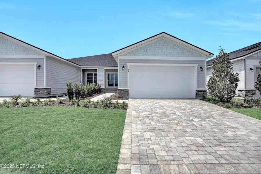 Front exterior of a new home in , St. Augustine, FL, highlighting curb appeal (Image 1). Front exterior of a new home in , St. Augustine, FL, highlighting curb appeal (Image 1).