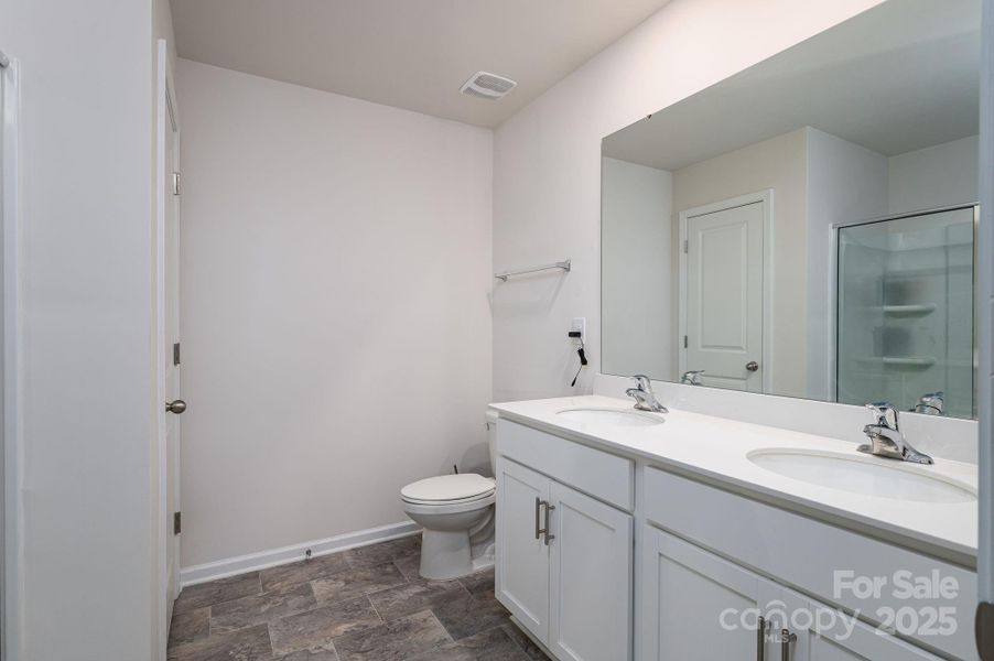 Furnished interior view inside a new home in Mills at Long Creek, Dallas (Image 6).