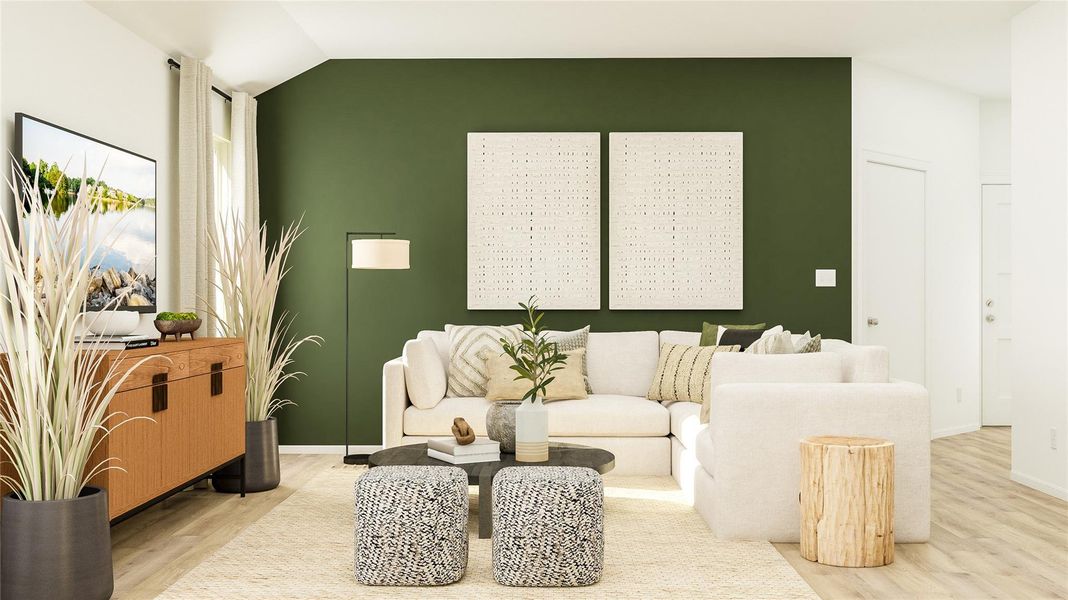 Living area with wood finished floors and baseboards Living area with wood finished floors and baseboards