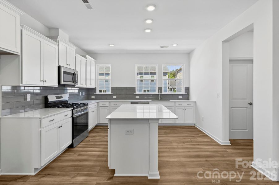 Center Island with rear kitchen