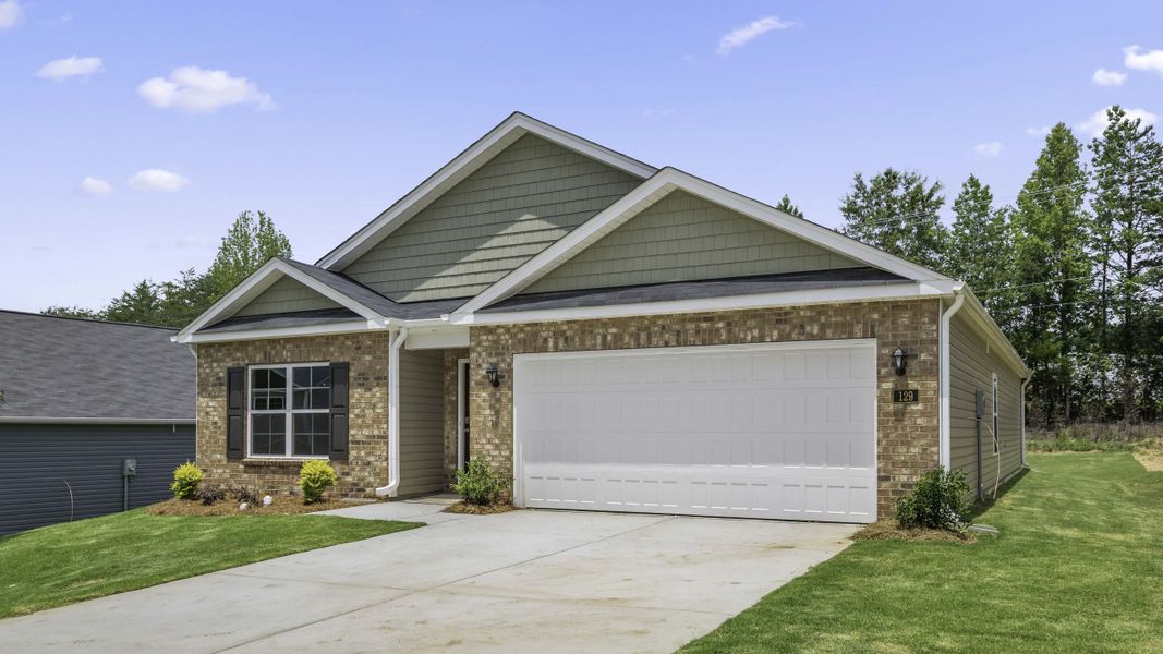 Front exterior of a new home in Greystone North, Stoneville, NC, highlighting curb appeal (Image 2). Front exterior of a new home in Greystone North, Stoneville, NC, highlighting curb appeal (Image 2).