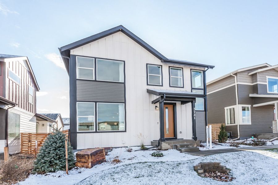 Representative exterior photo of a completed home built from the Newton by Hartford Homes in Trailside, Timnath, CO (Image 22).