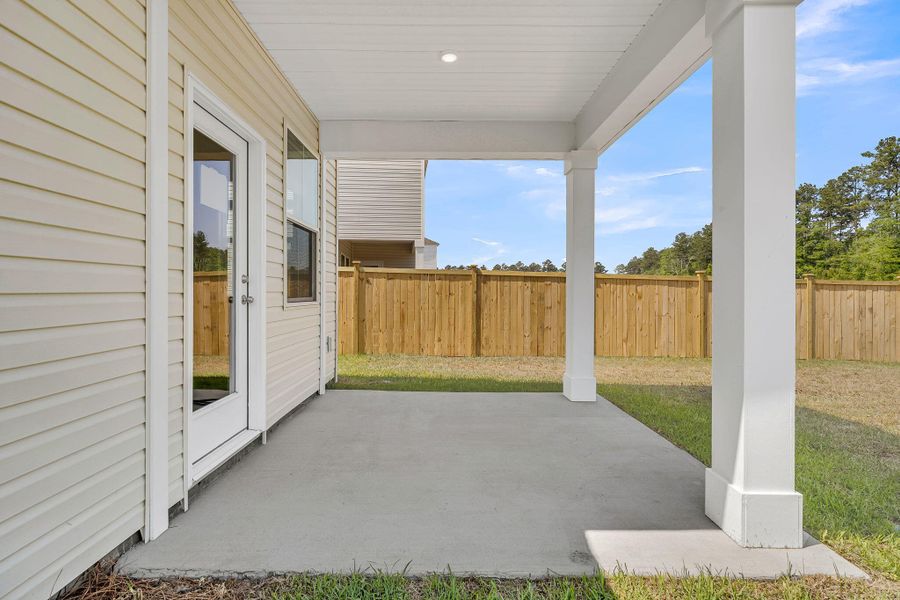 Exterior details and patio area of a home in Wildcat Chase, Summerville (Image 4).
