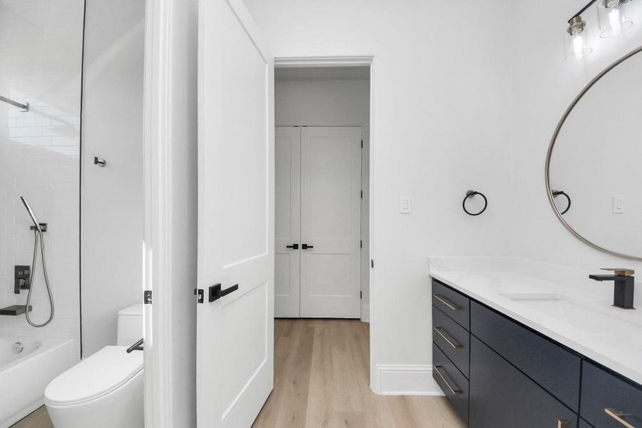 The shared secondary has a combo shower/tub. The shared secondary has a combo shower/tub.