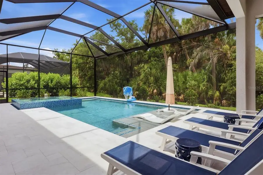 Exterior details and patio area of a home in , Sarasota (Image 27).