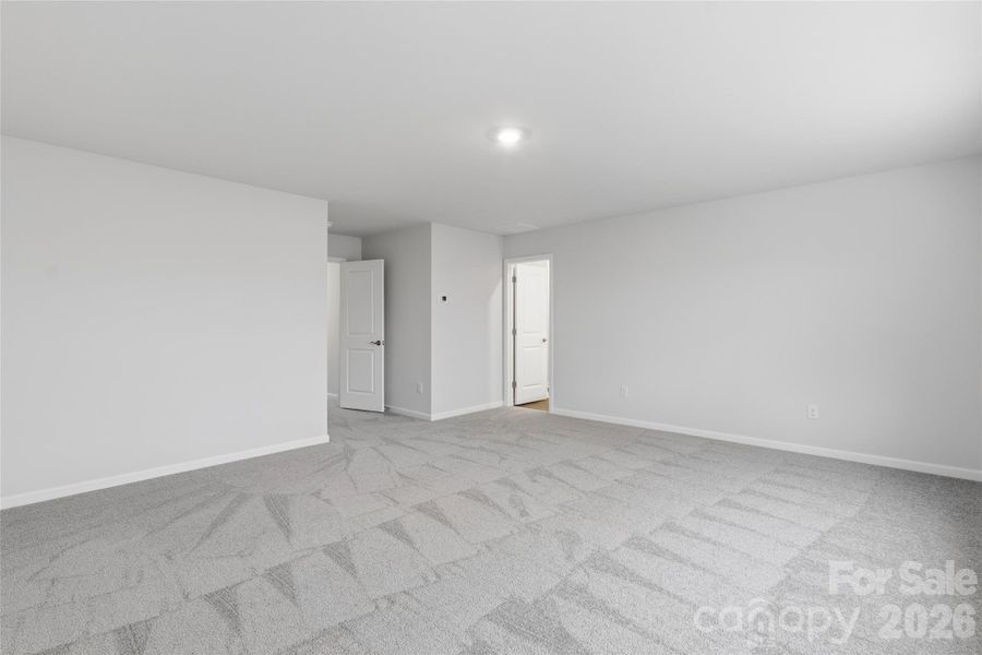 Spacious, unfurnished interior of a new home in Redhawk: Enclave, Belmont (Image 16).