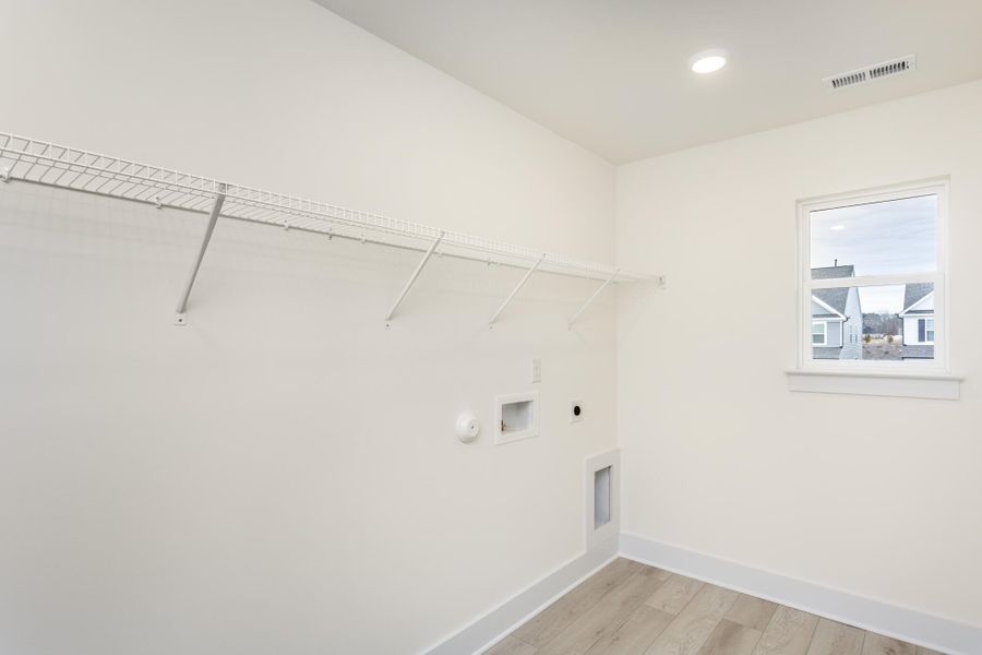 Spacious, unfurnished interior of a new home in Ford Meadows, Garner (Image 31).