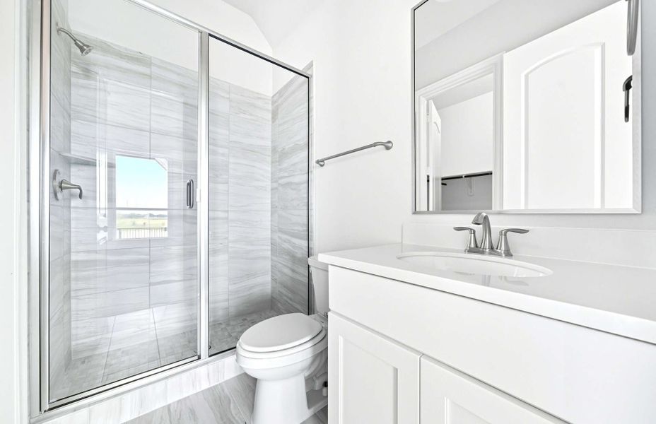 Representative furnished interior of a home built from the 3663 by Ravenna Homes in Artavia 70′, Conroe (Image 18).