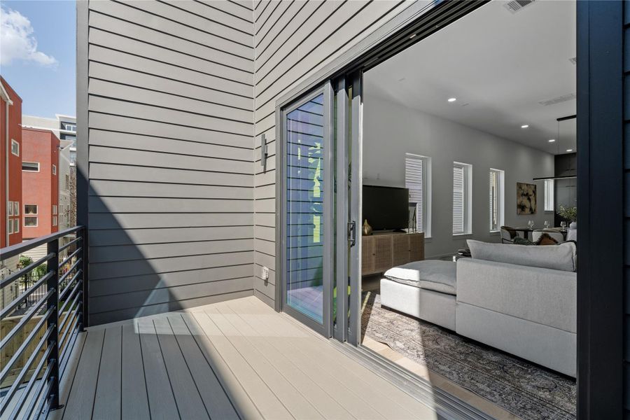 Seamlessly extend your living space outdoors with expansive sliding glass doors that open to a private balcony—an ideal perch for sunrise rituals, sunset reflections, or a quiet moment above the city buzz. Seamlessly extend your living space outdoors with expansive sliding glass doors that open to a private balcony—an ideal perch for sunrise rituals, sunset reflections, or a quiet moment above the city buzz.