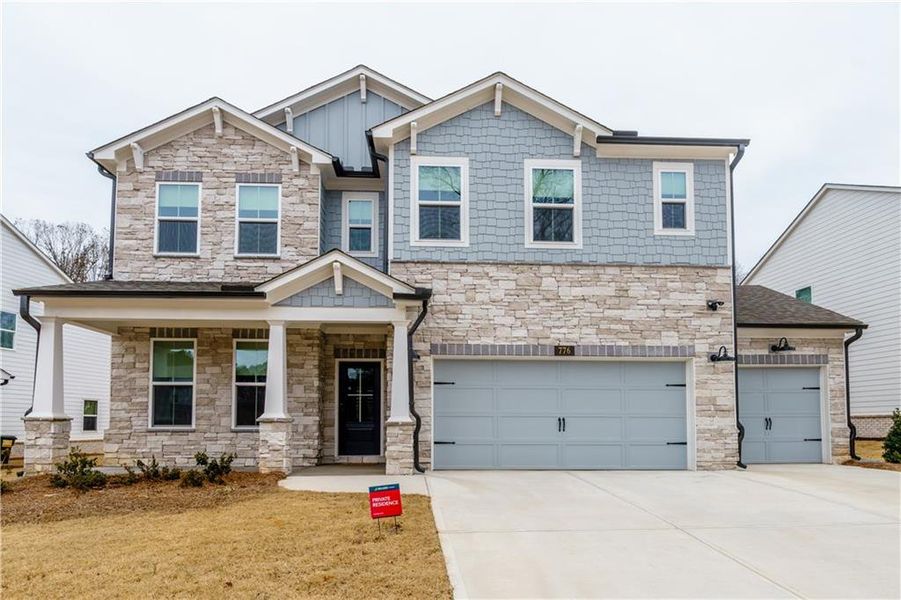 Front exterior of a new home in , Powder Springs, GA, highlighting curb appeal (Image 2). Front exterior of a new home in , Powder Springs, GA, highlighting curb appeal (Image 2).