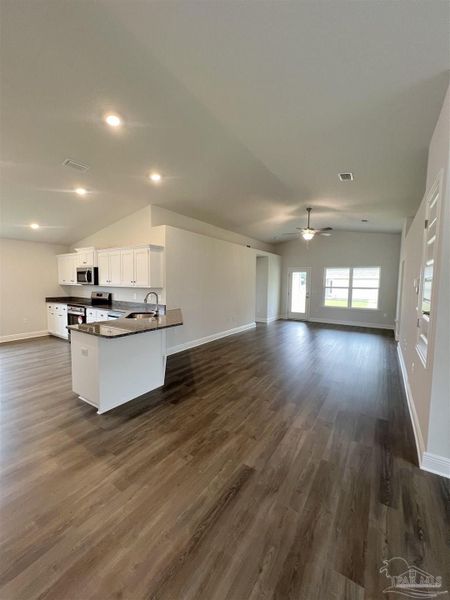 Furnished interior view inside a new home in Pine Top, Cantonment (Image 4).