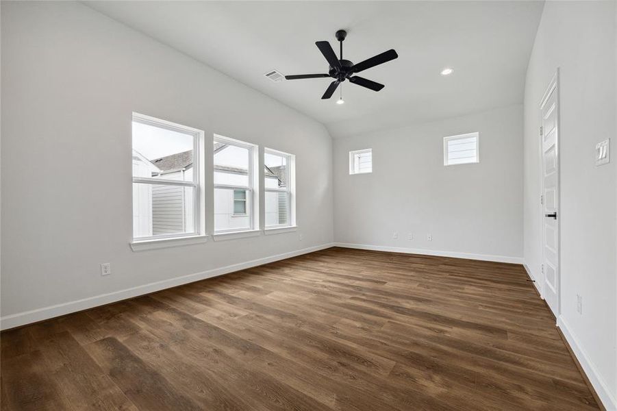 Soaring ceilings in the primiary bedroom leading to the spa-like bathroom, and walk-in closet.