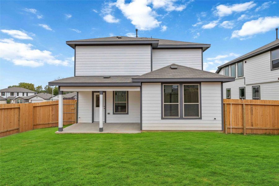 Exterior details and patio area of a home in Lexington Heights, Willis (Image 3).