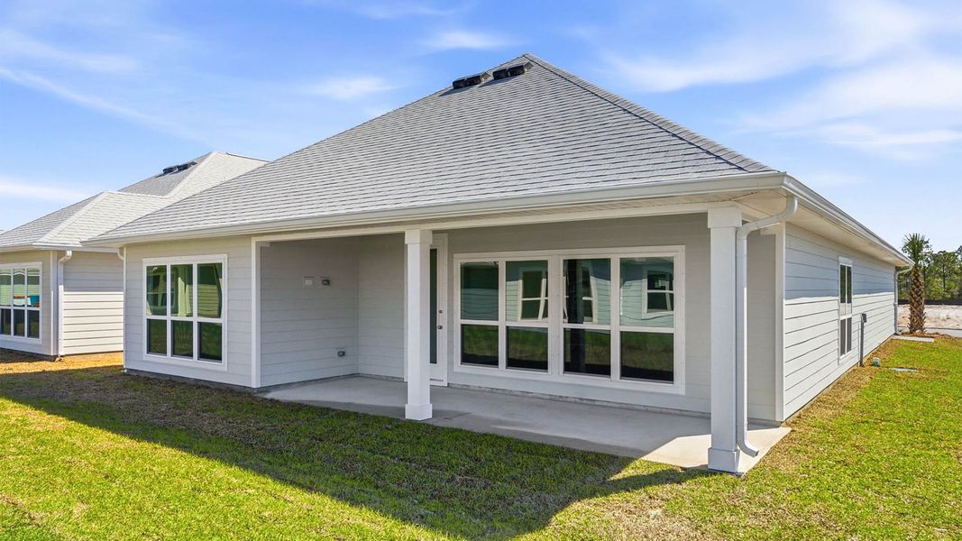 Exterior details and patio area of a home in WindMark Beach, Port Saint Joe (Image 3).