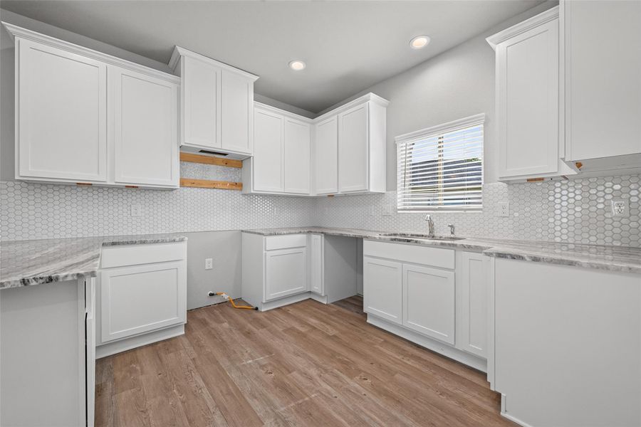 Furnished interior view inside a new home in Woodland Lakes, Huffman (Image 6).