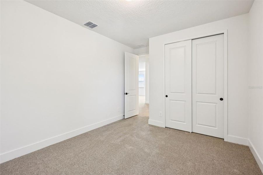 Spacious, unfurnished interior of a new home in Ridgehaven - Signature Series, Ormond Beach (Image 51).