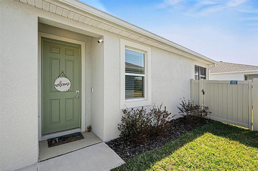 Exterior details and patio area of a home in Woodcreek, Wesley Chapel (Image 4).