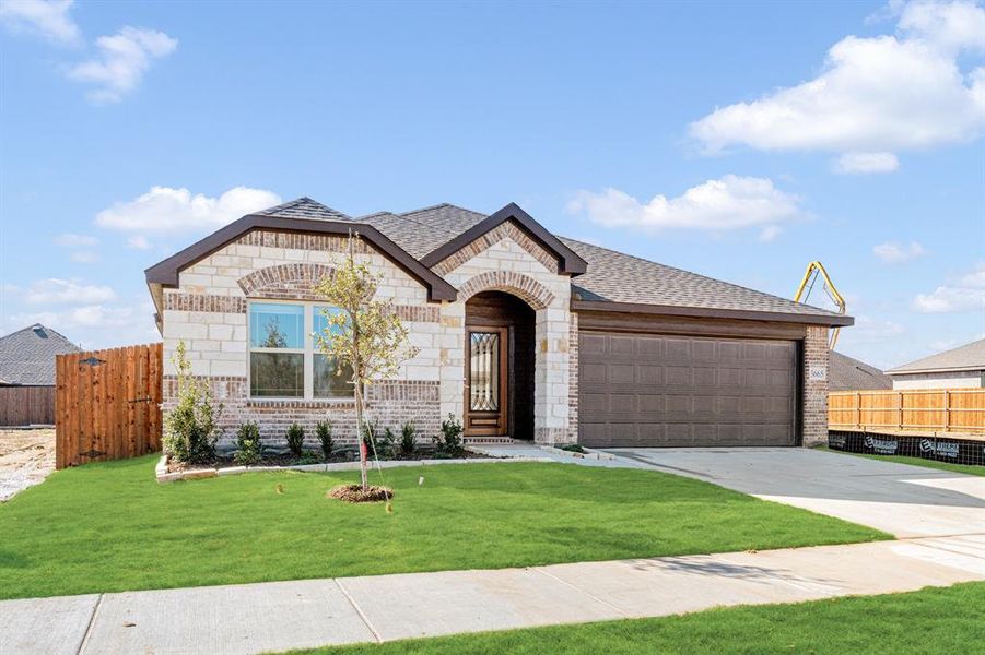 Front exterior of a new home in Georgetown at Kings Fort 50s, Kaufman, TX, highlighting curb appeal (Image 1).